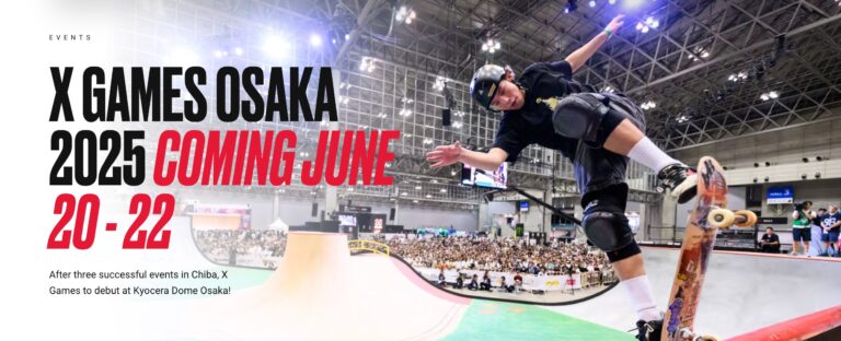 Professional skateboarder performing an aerial trick mid-air during X Games Osaka 2025 at Kyocera Dome.